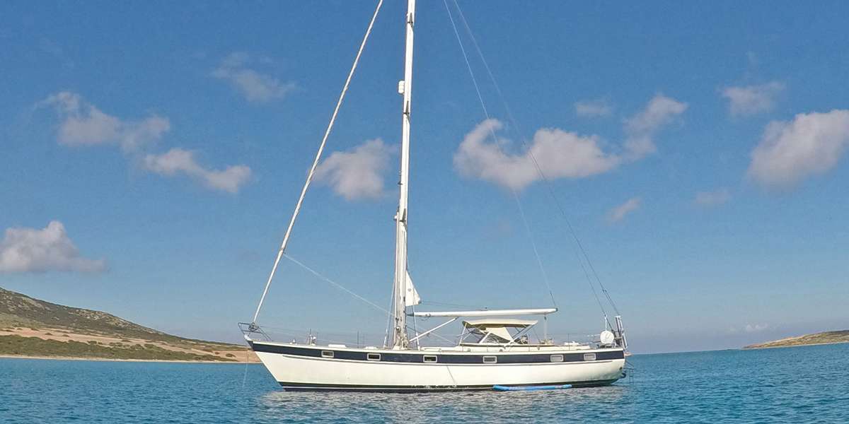 Relax in the comfort of a Hallberg-Rassy 49 with a skipper and hostess